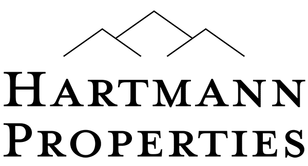 Black logo of Hartmann Properties